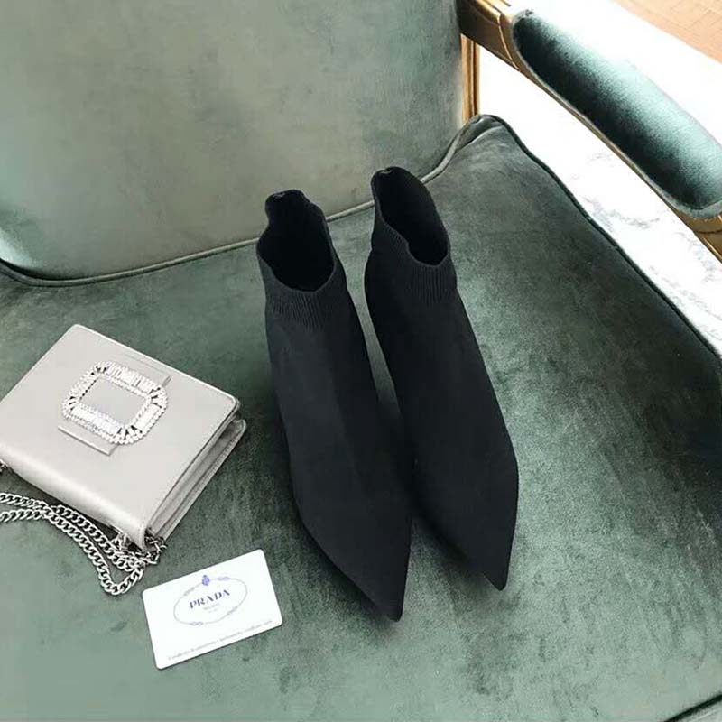 Back view of Prada Women Shoes Fabric Booties 55mm Heel-Black showcasing heel height