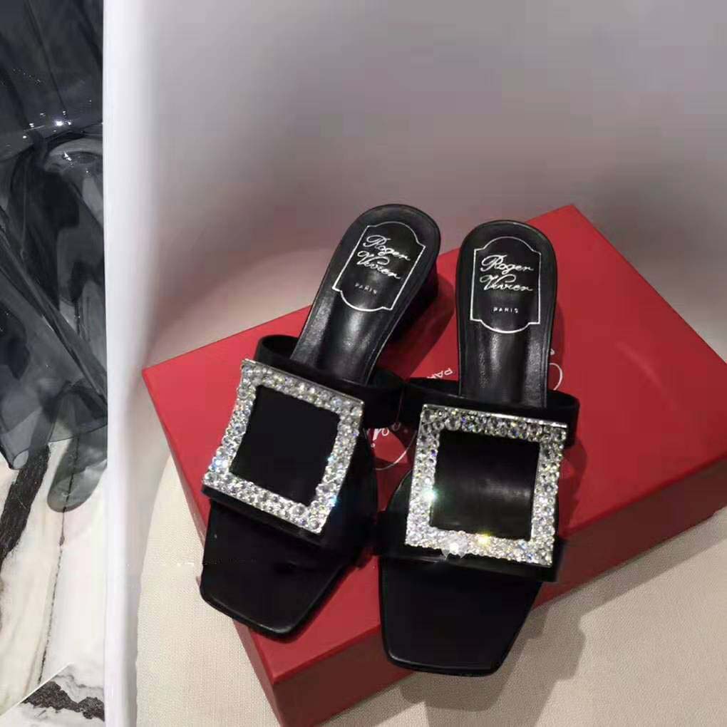 Top-down look at the leather and slip-on design of Roger Vivier Women Bikiviv’ Strass Mules-Black