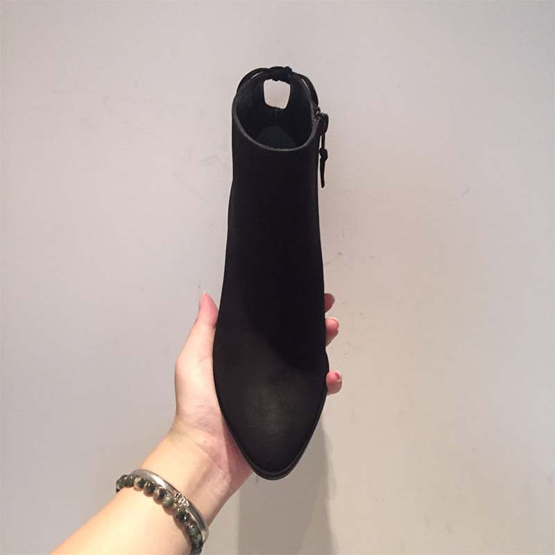 Close-up of black leather and heel on The Lofty Bootie 80mm Heel-Black