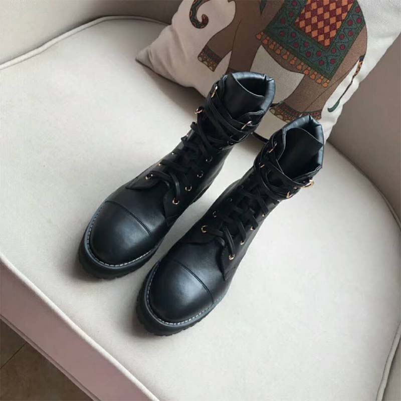 Close-up on studded leather detail of The Strummer Boot by Stuart Weitzman