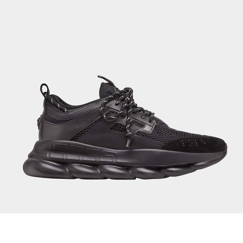 Side view of Versace Men Chain Reaction Sneakers-Black showing chain-link sole
