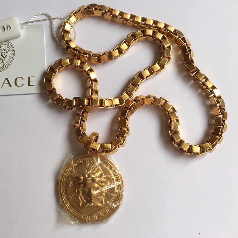 Close-up on Medusa emblem of Versace Unisex Single Medusa Necklace