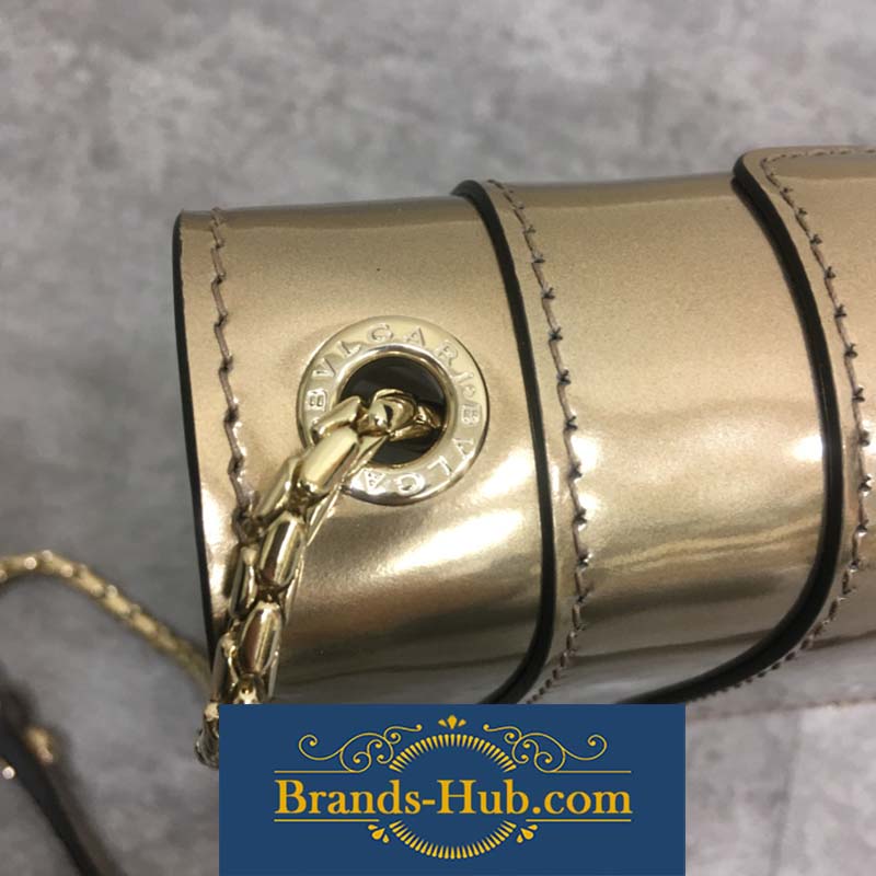 Side view highlighting metallic calfskin texture on Bvlgari Serpenti Forever bag
