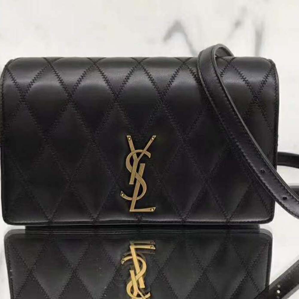 Close-up of diamond-quilted lambskin and silver YSL chain detail