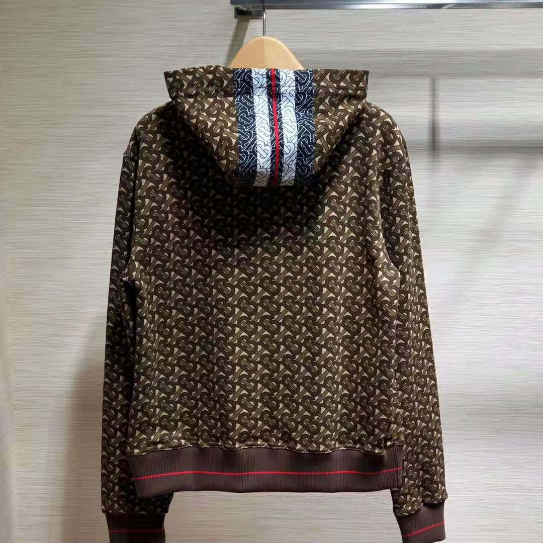 Side angle showing oversized fit of Burberry Men Monogram Stripe Print Hoodie