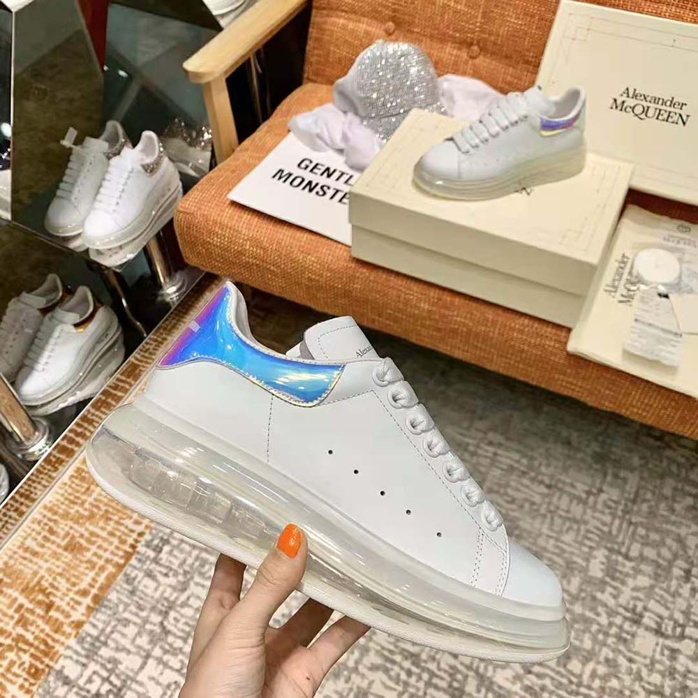 Top angle showing lace-up and padded tongue of Alexander Mcqueen Women Oversized Sneaker-Blue
