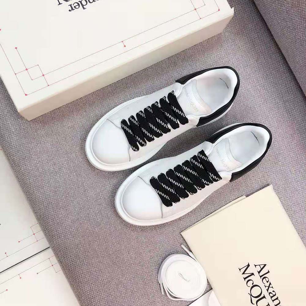 Side view highlighting the chunky sole of Alexander Mcqueen Women Oversized Sneaker