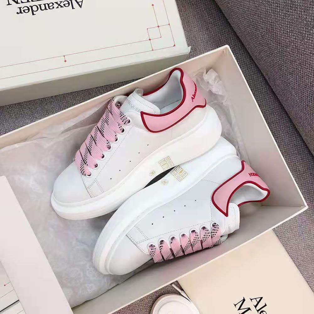 Close-up on pink heel detail of Alexander Mcqueen Women Oversized Sneaker