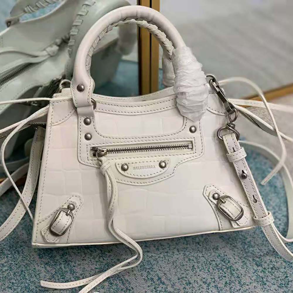 Close-up of silver-tone hardware on Balenciaga Women Neo Classic Mini Top Handle Bag-White