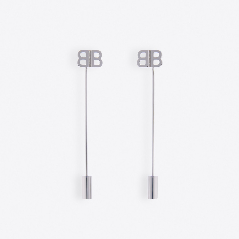 Close-up of Balenciaga Women Pin BB Earrings in silver finish