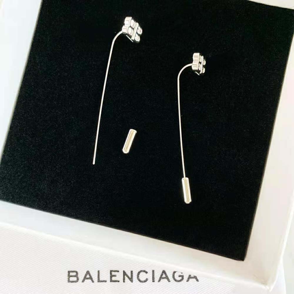 Side angle showing the pin silhouette of Balenciaga Women Pin BB Earrings