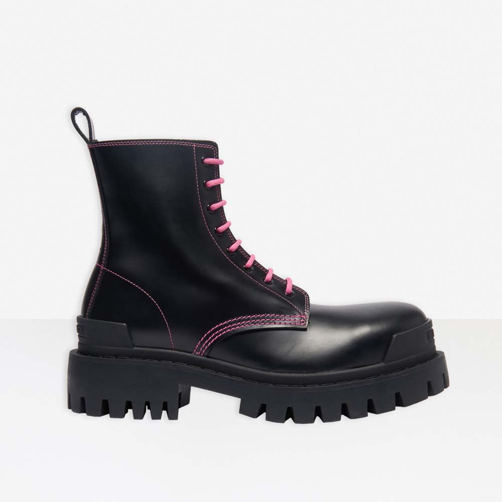 Side angle of Balenciaga Women Strike 20mm Lace-Up Boot in Black Matte Calfskin-Pink