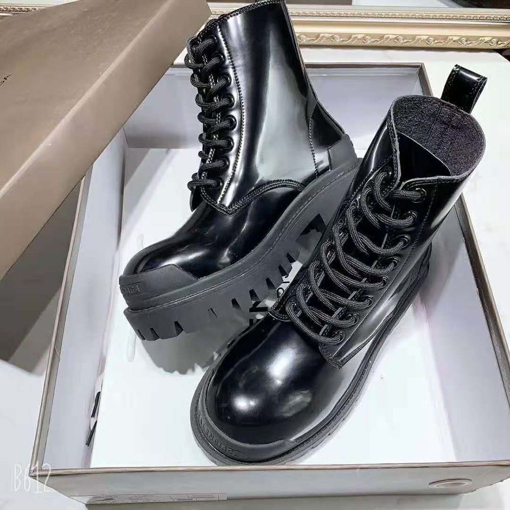 Rear angle showing heel and embossed logo on Balenciaga Strike Boot