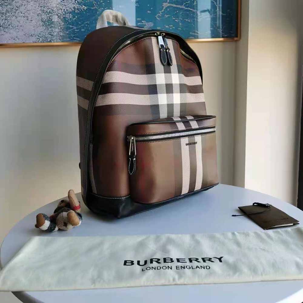 Side angle showing slim silhouette of Burberry Men Check E-canvas Backpack-Brown