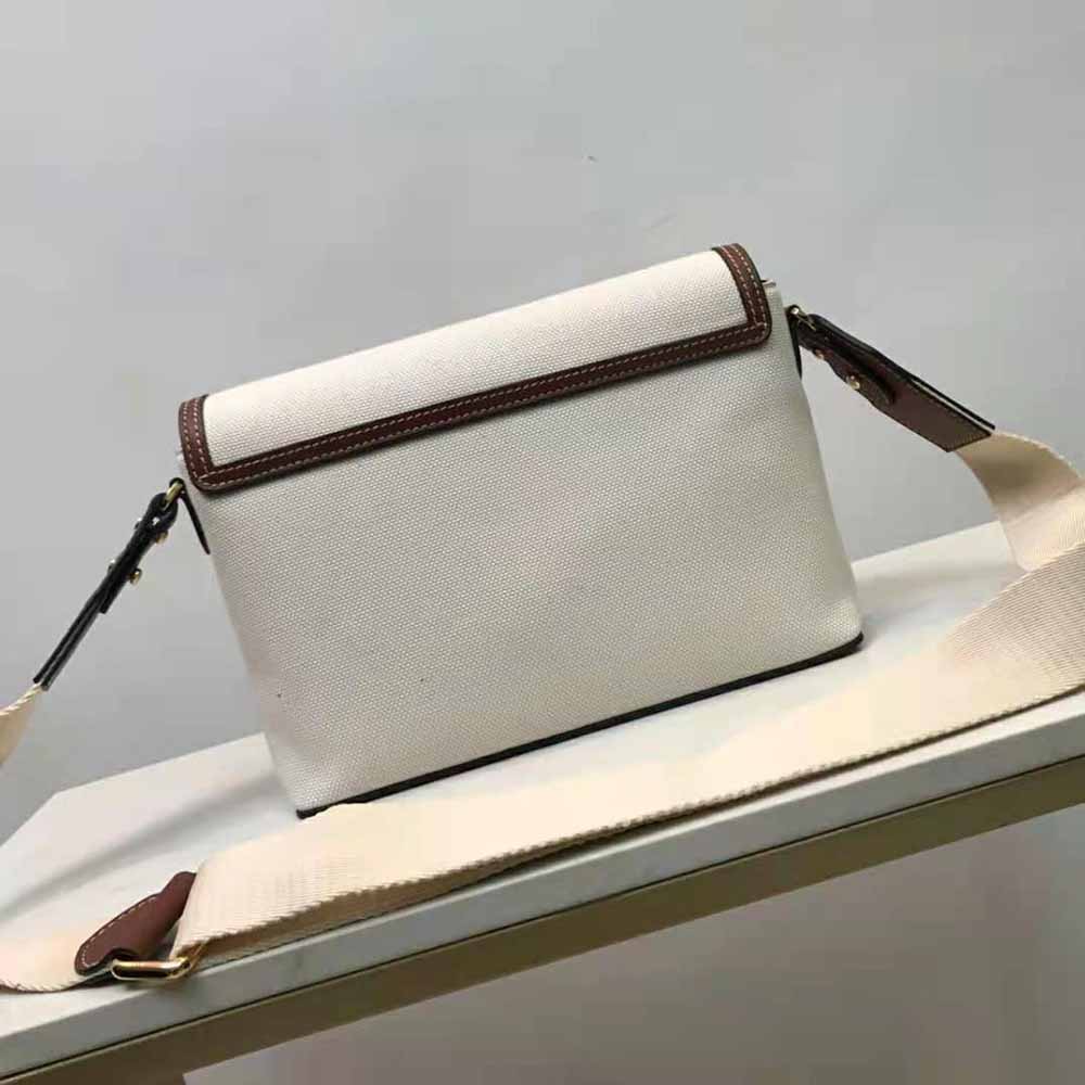 Side profile showing adjustable strap on Burberry Women Horseferry Print Canvas Note Crossbody Bag