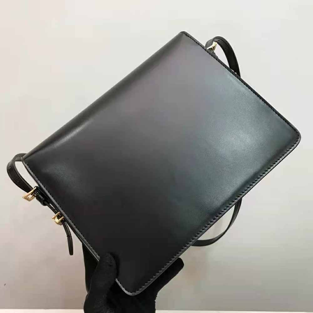 Side profile showcasing spacious silhouette of Burberry Women Large Leather Grace Bag-Black