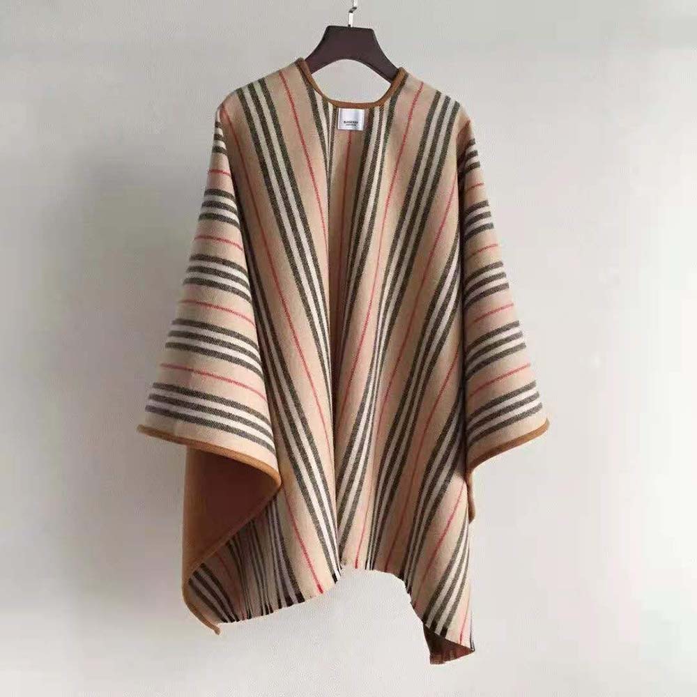 Side angle highlighting wool texture on Burberry Women Lcon Stripe Detail Wool Cape-Brown