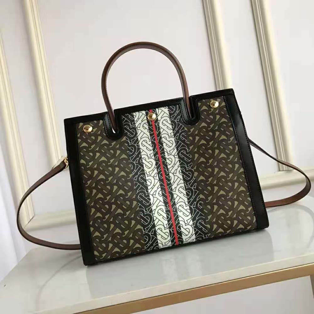 Side angle showing adjustable strap on Burberry Medium Monogram Bag