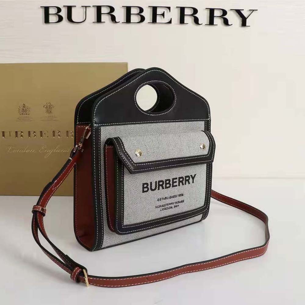 Side view showing black leather trim on Burberry Women Mini Pocket Bag