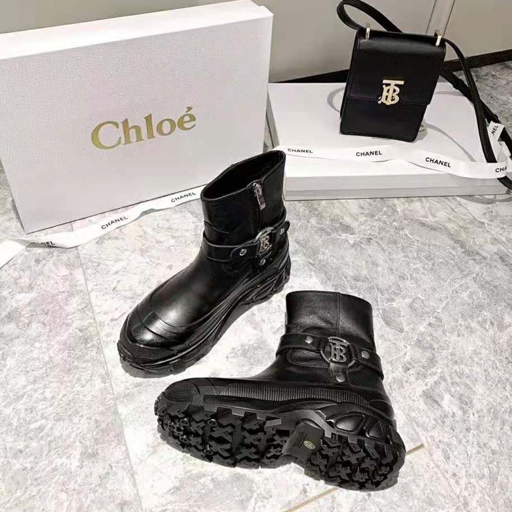 Top view showing leather texture of Burberry Women Monogram Motif Buckle Leather Boots-Black