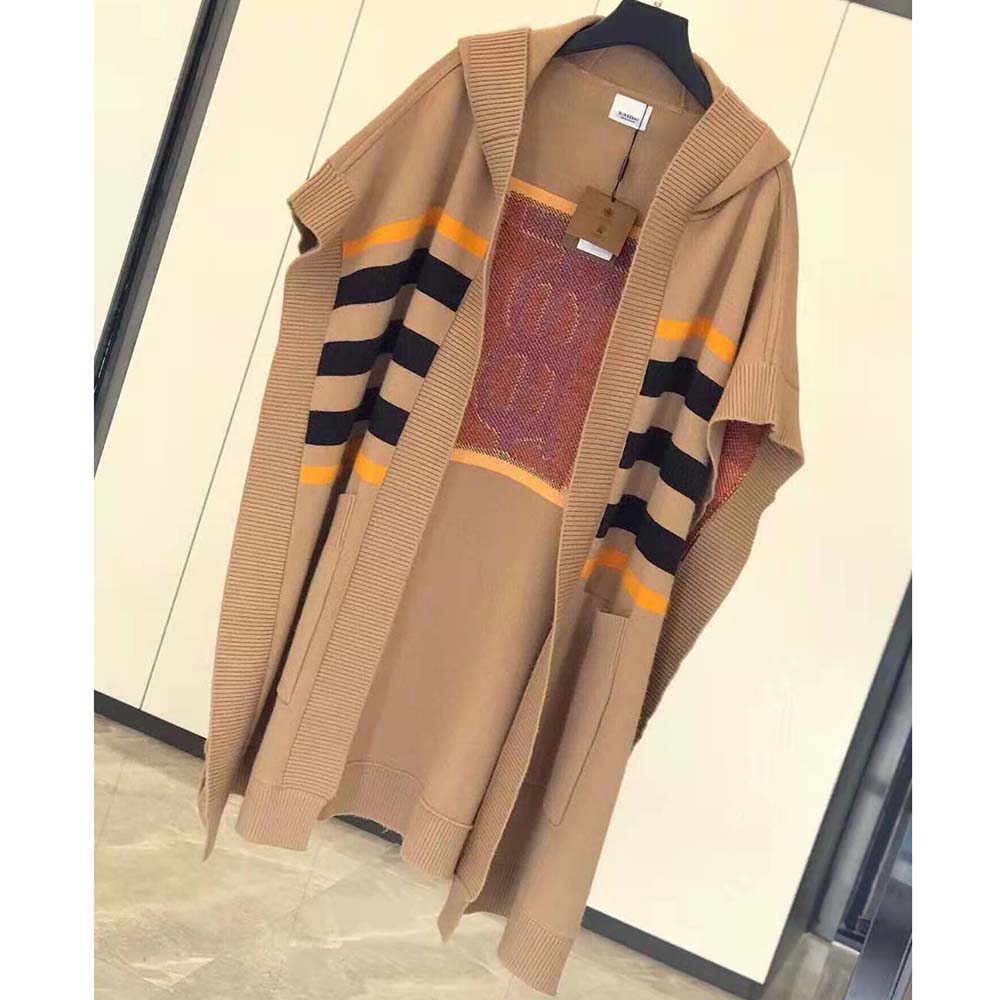 Close-up of brown monogram intarsia detail on Burberry wool cashmere cape