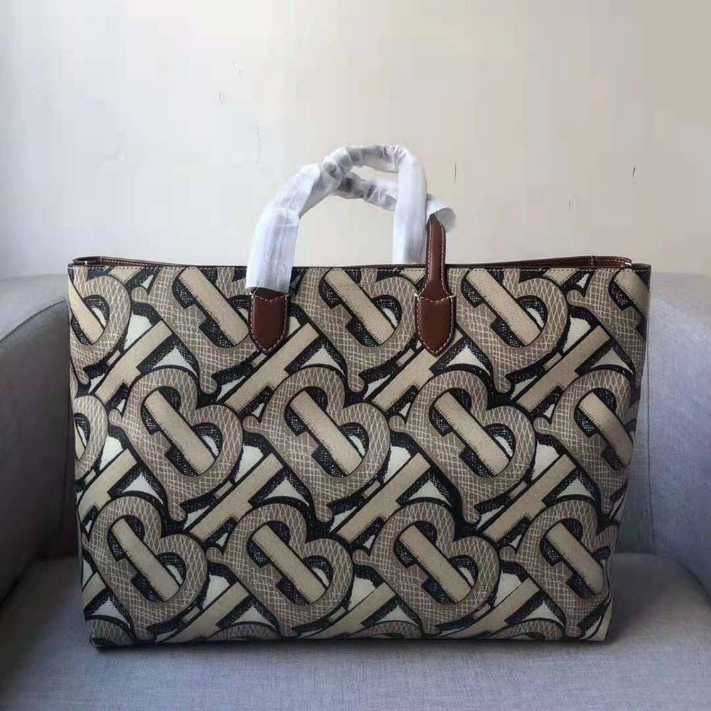 Side profile showing spacious interior of Burberry Women Monogram Print Tote Bag