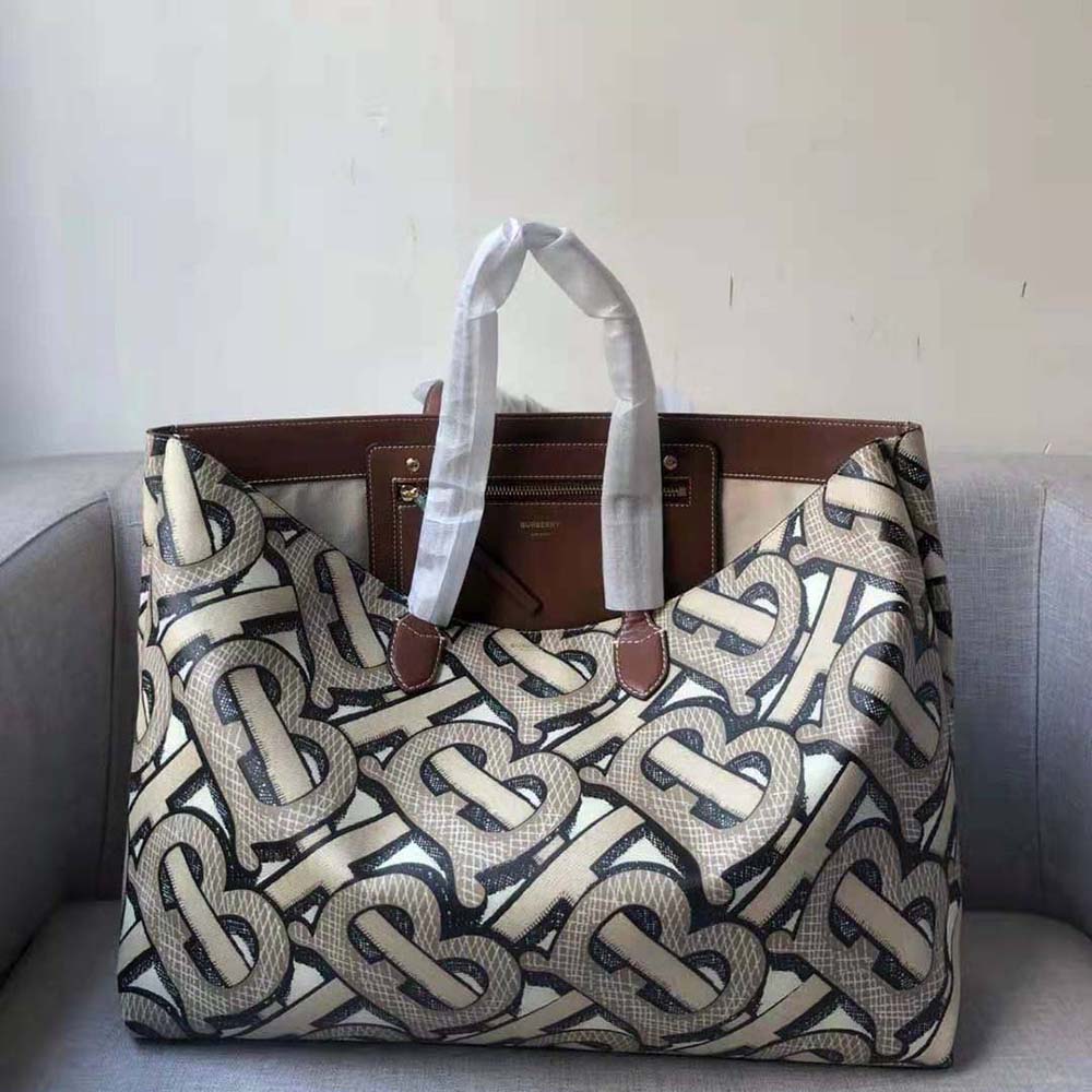 Close-up of gold-tone hardware on Burberry Women Monogram Print Tote