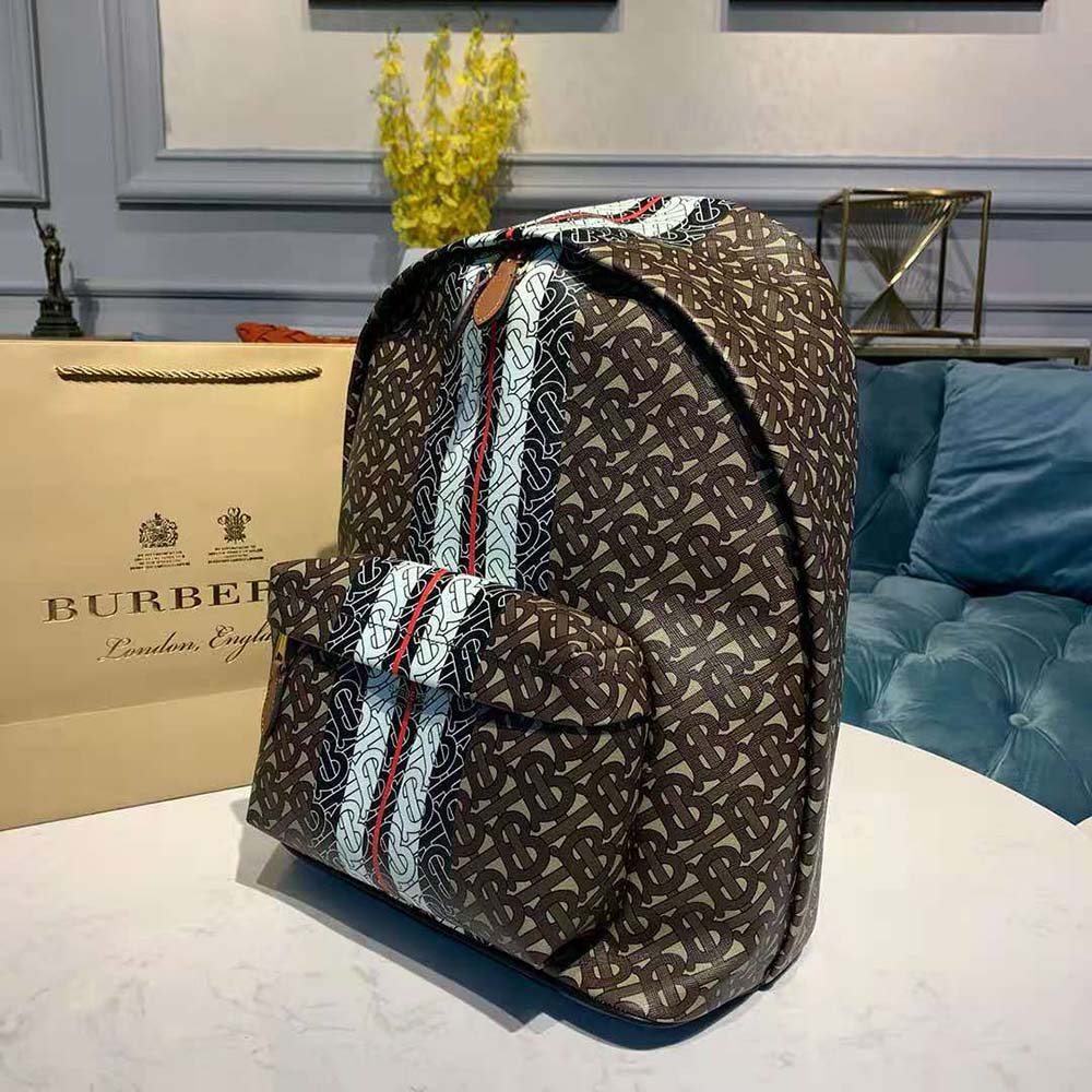 Side angle showing antique gold hardware on Burberry E-canvas Backpack