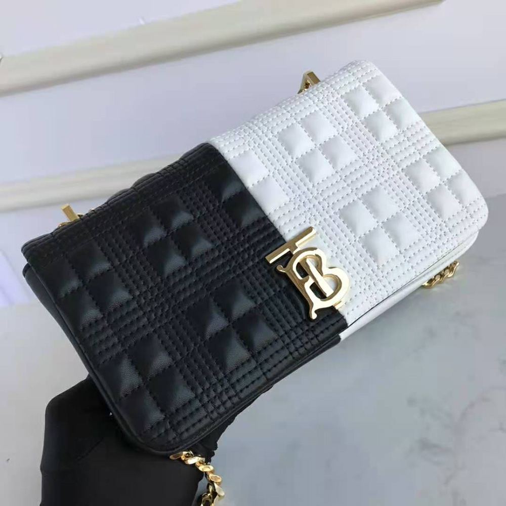 Side angle showing quilting detail and chain strap on Burberry Lola Bag