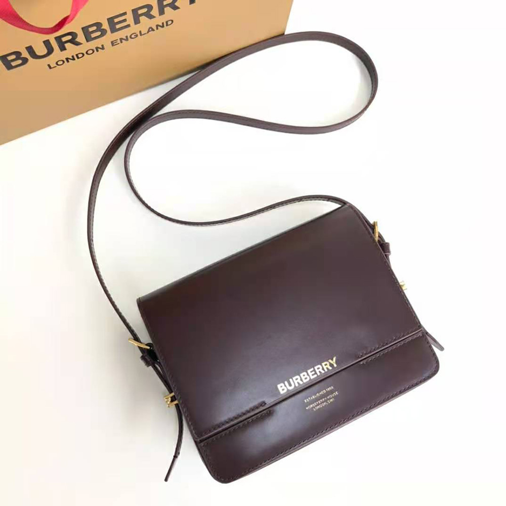 Side angle showing two-tone leather detail on Burberry Women Small Two-tone Leather Grace Bag-Maroon