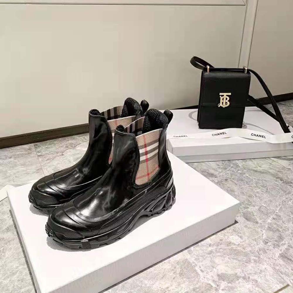 Close-up of vintage check detail and elastic gusset on Burberry Chelsea boots