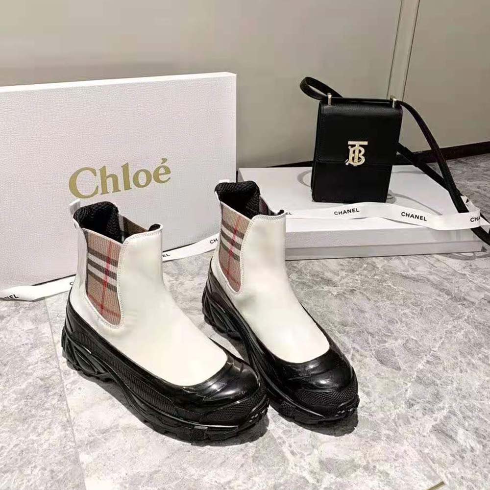 Close-up of vintage check pattern on Burberry Women Chelsea Boots-White coated canvas
