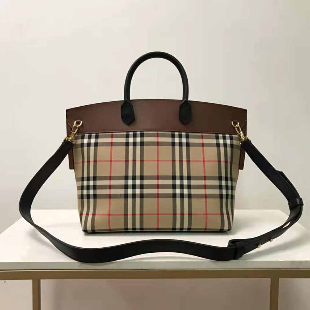 Side angle of brown Burberry Women Vintage Check and Leather Society Top Handle Bag