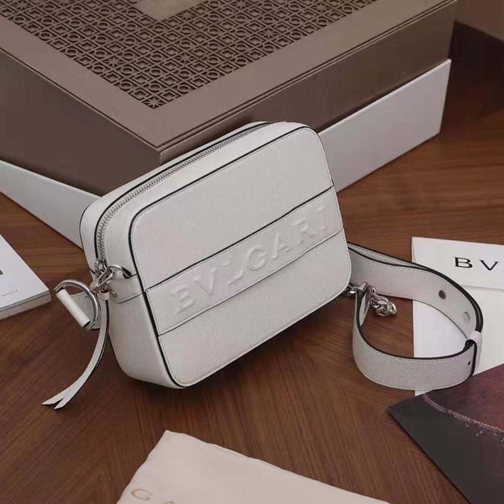 Side angle showing adjustable strap of Bvlgari Women Bvlgari Logo Camera Bag