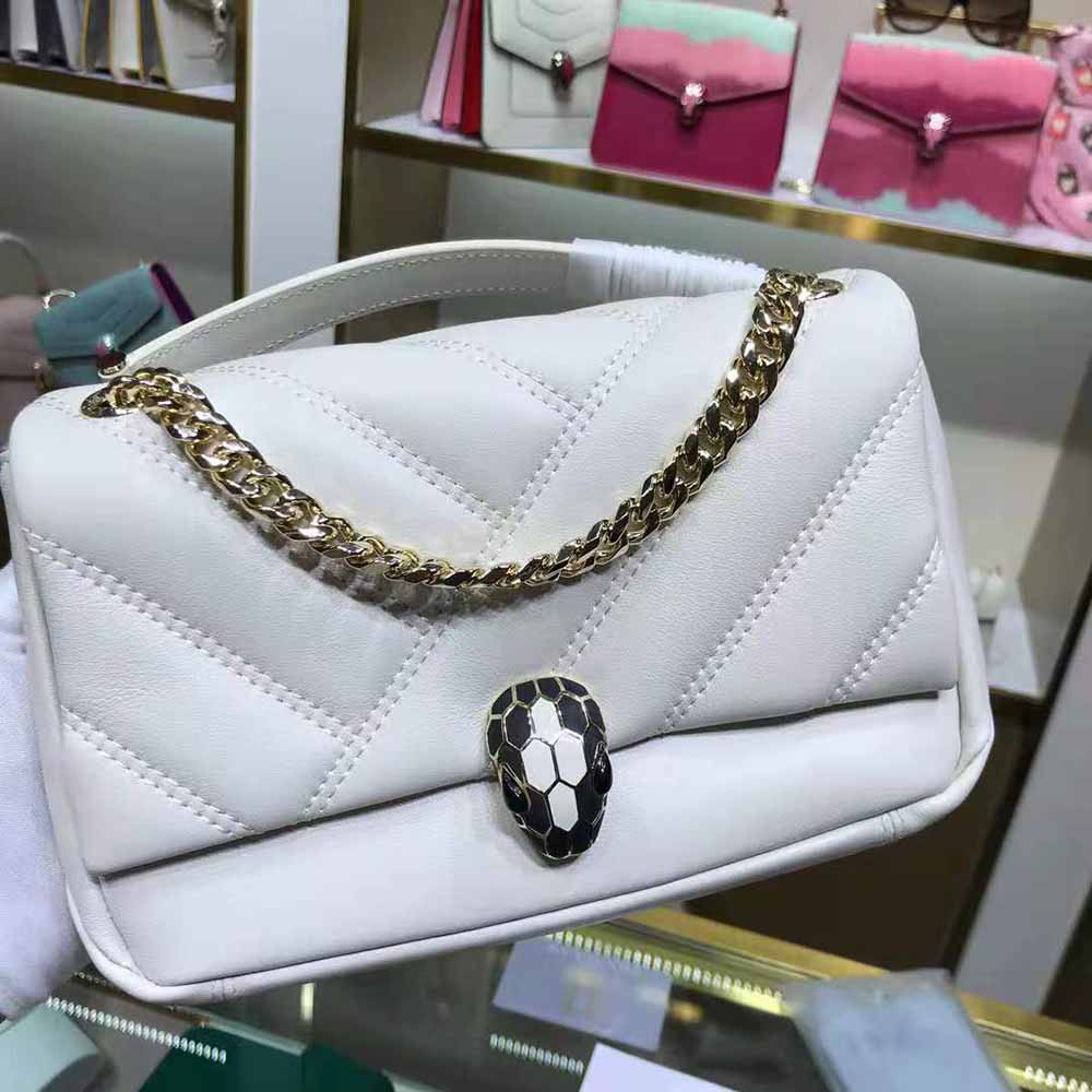 Side angle showing smooth leather and adjustable strap of Bvlgari Women Serpenti Cabochon Shoulder Bag-White