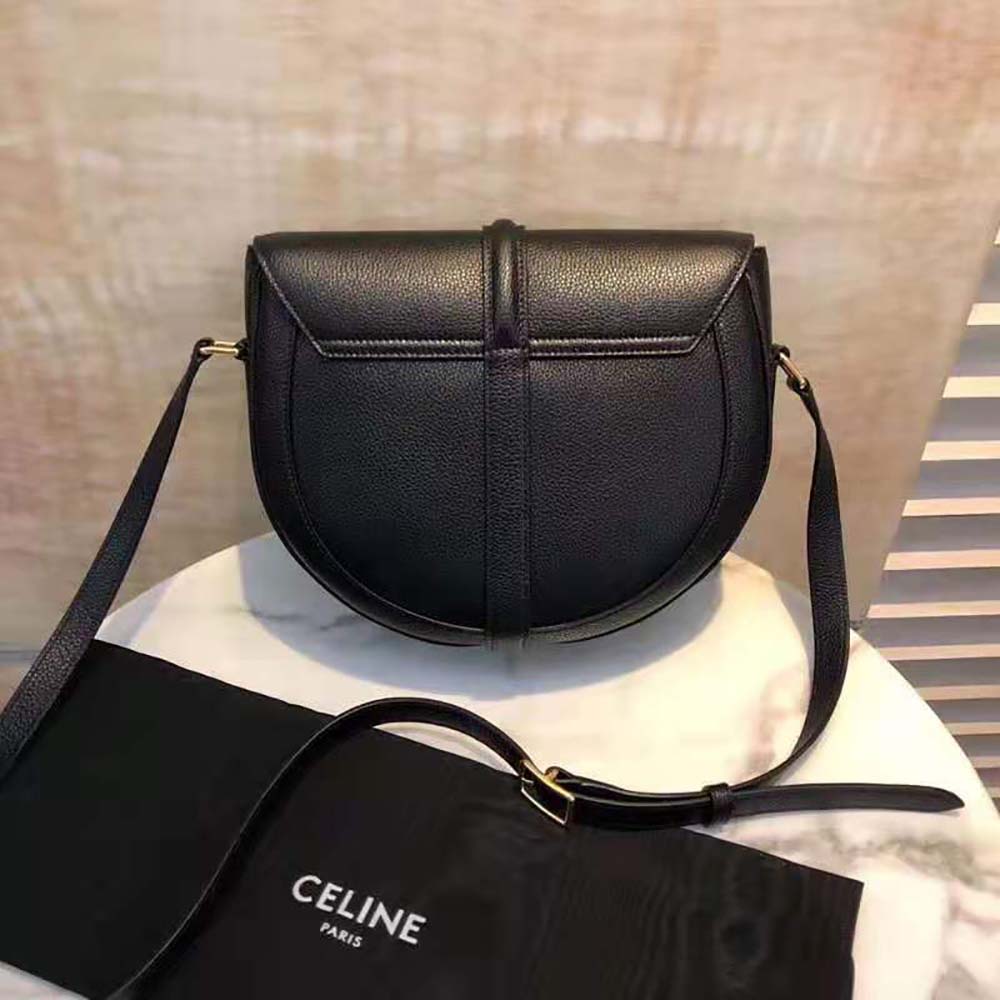 Side angle showing slim silhouette of Celine Women Besace 16 in Grained Calfskin-Black