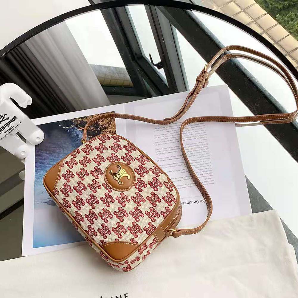 Side angle showing gold-tone hardware on Celine Women Camera Bag