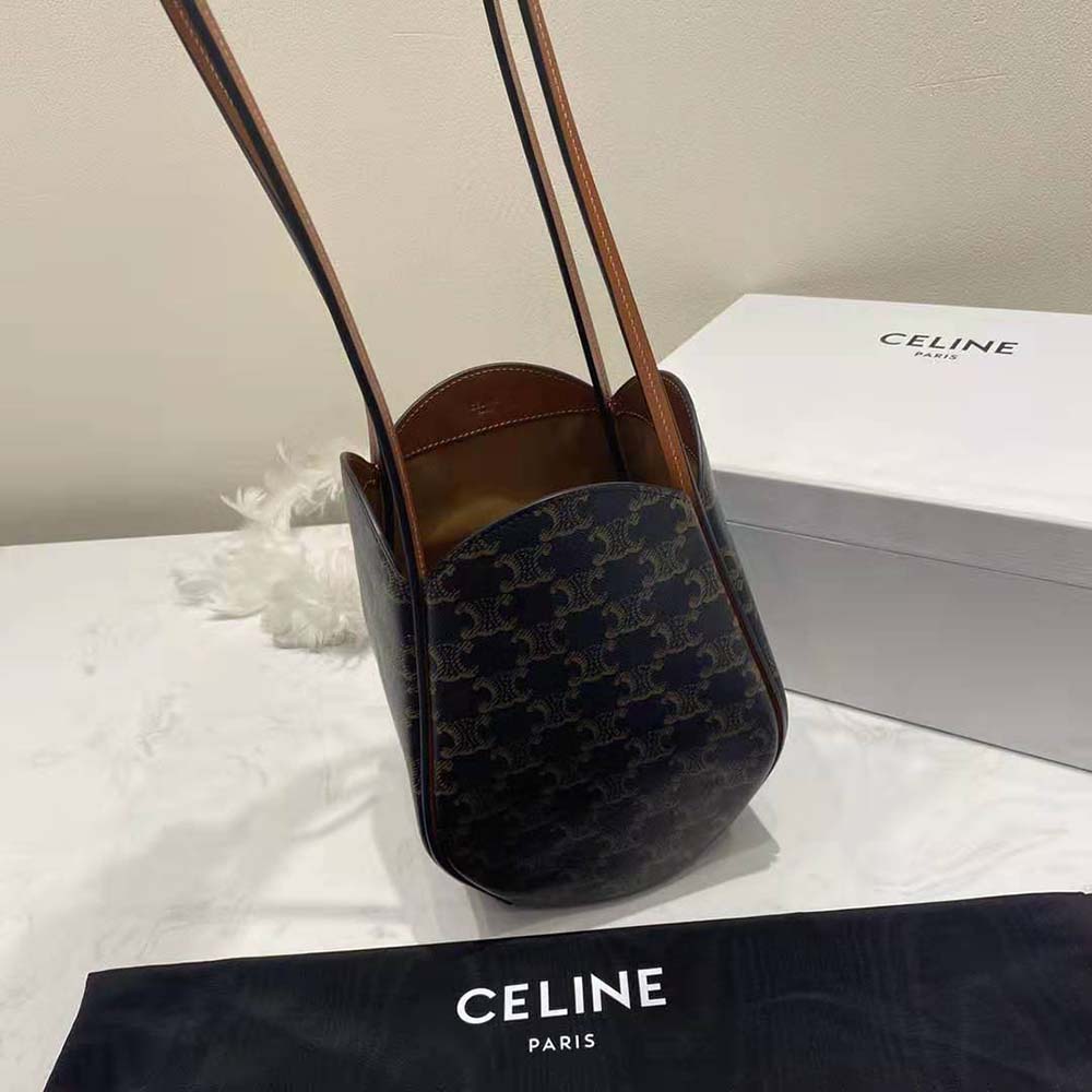 Close-up of gold-tone Triomphe clasp on Celine Marlou Bag
