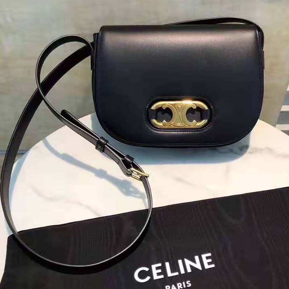 Close-up of gold Maillon Triomphe chain on Celine Medium shoulder bag