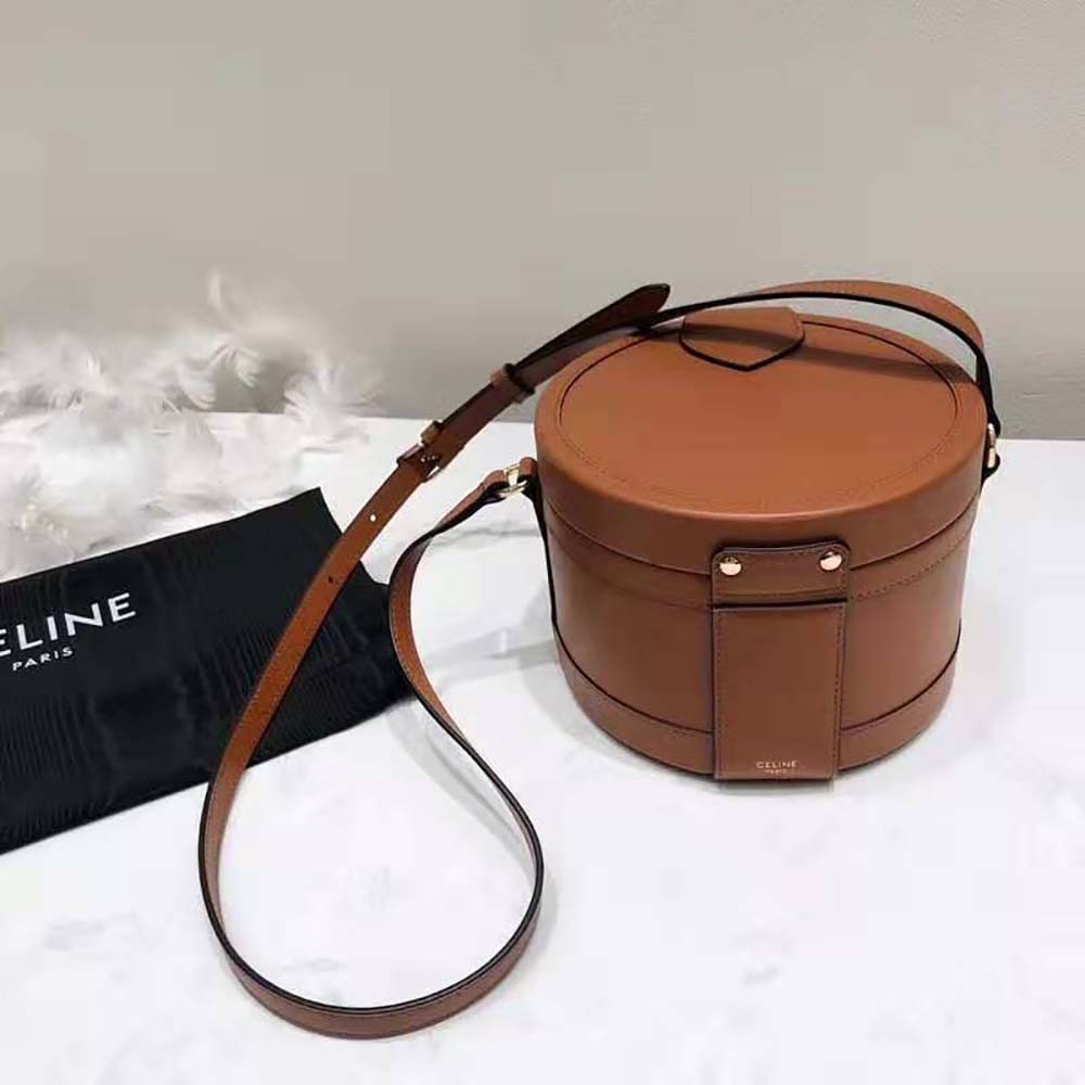Side angle showing structured silhouette of Celine Women Medium Tambour Bag