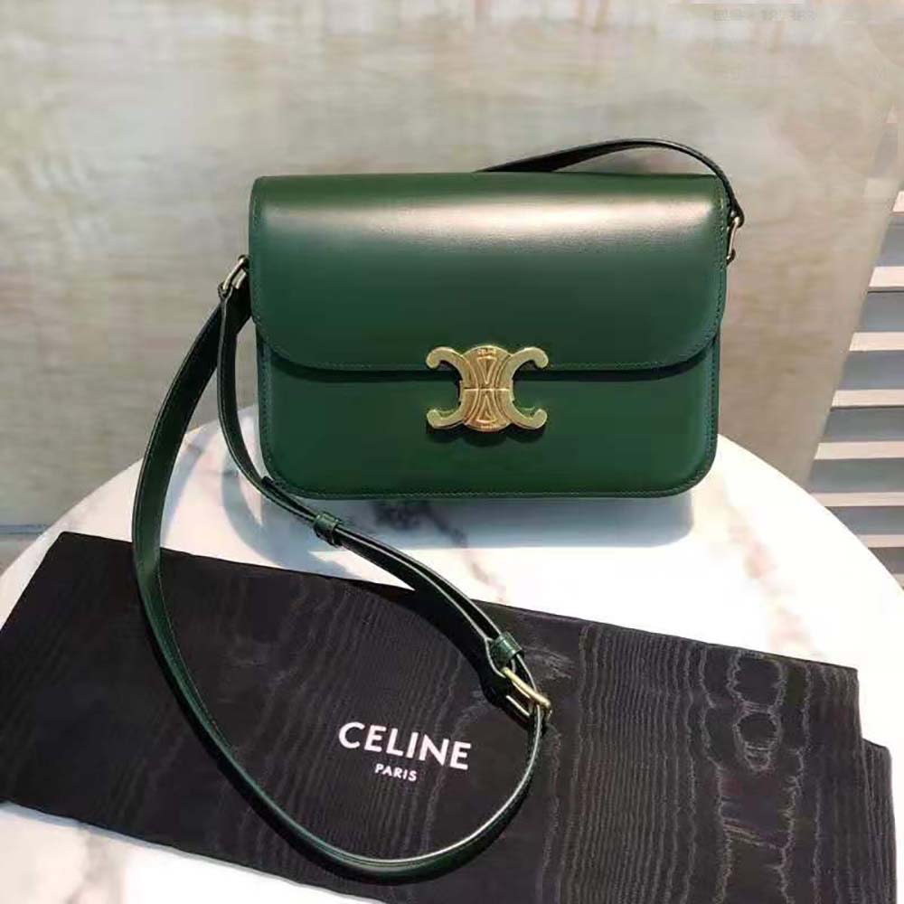 Close-up of gold-tone Triomphe clasp on Celine Women Medium Triomphe Bag