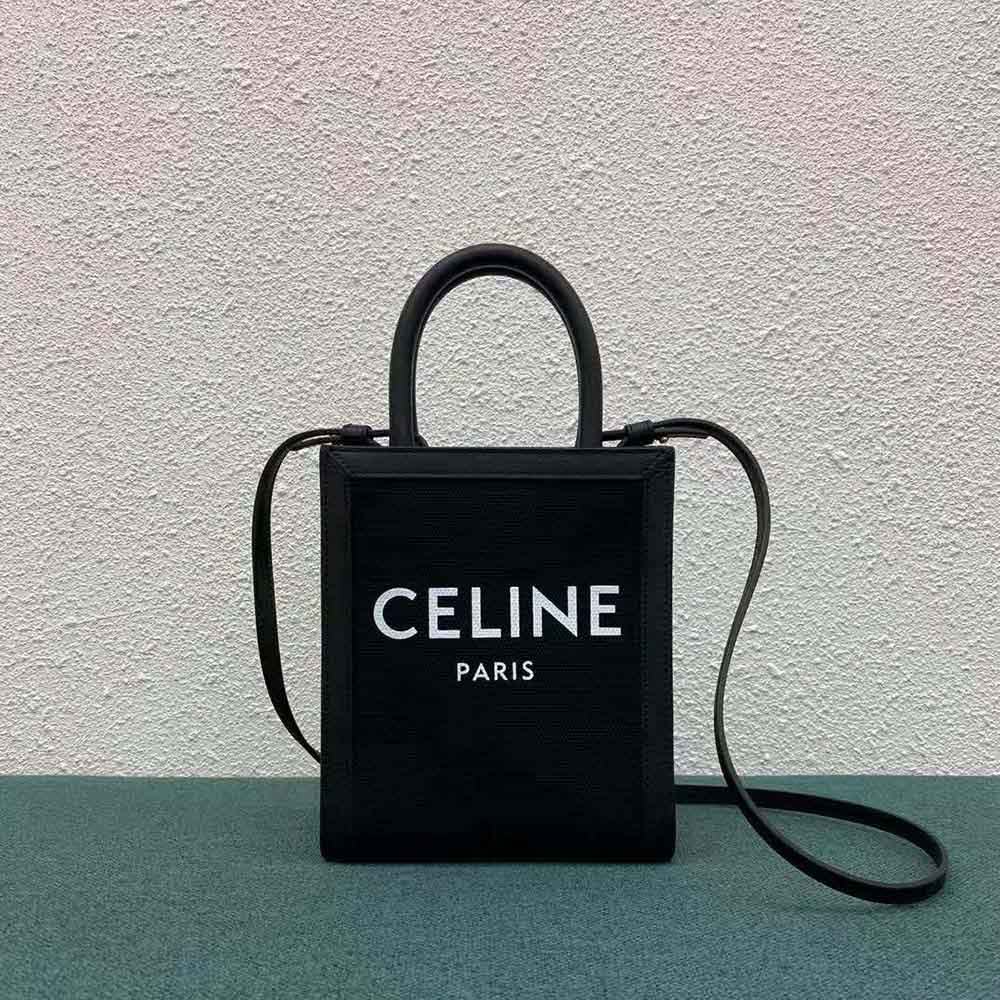 Close-up of calfskin trim and gold hardware on Mini Vertical Cabas Celine