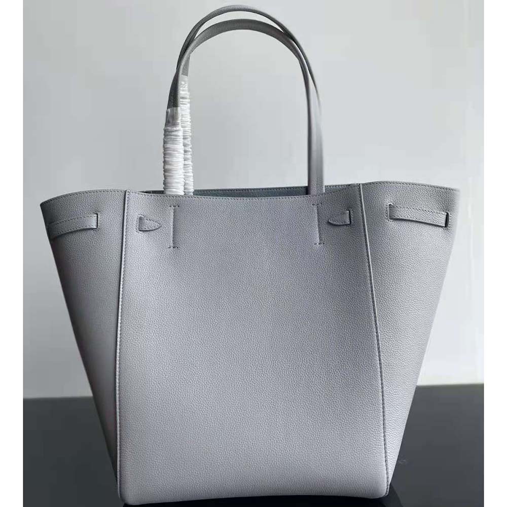 Side profile showing compact silhouette of Celine Women Small Cabas Phantom blue