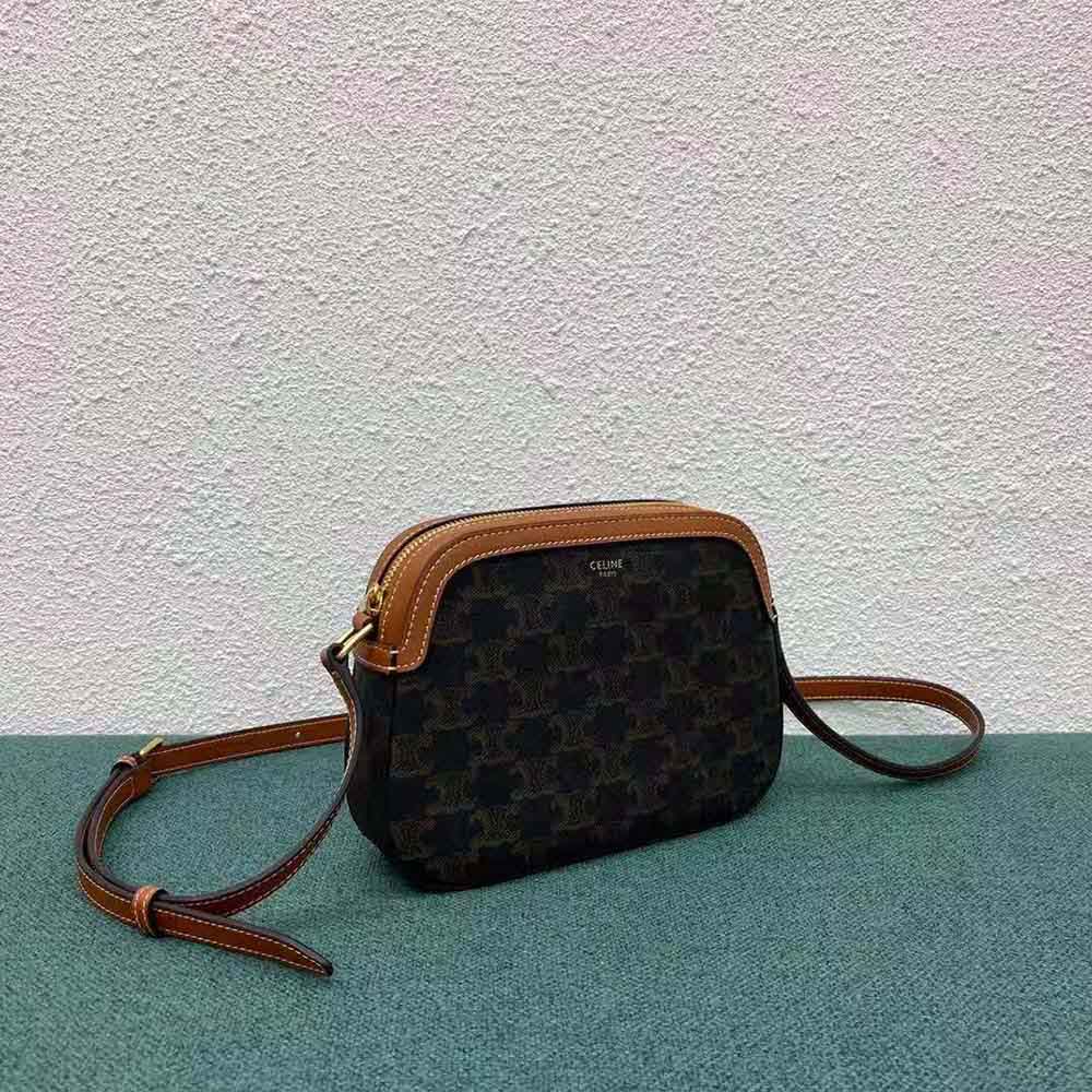 Close-up of gold-tone hardware and zipper on Celine Women Small Camera Bag