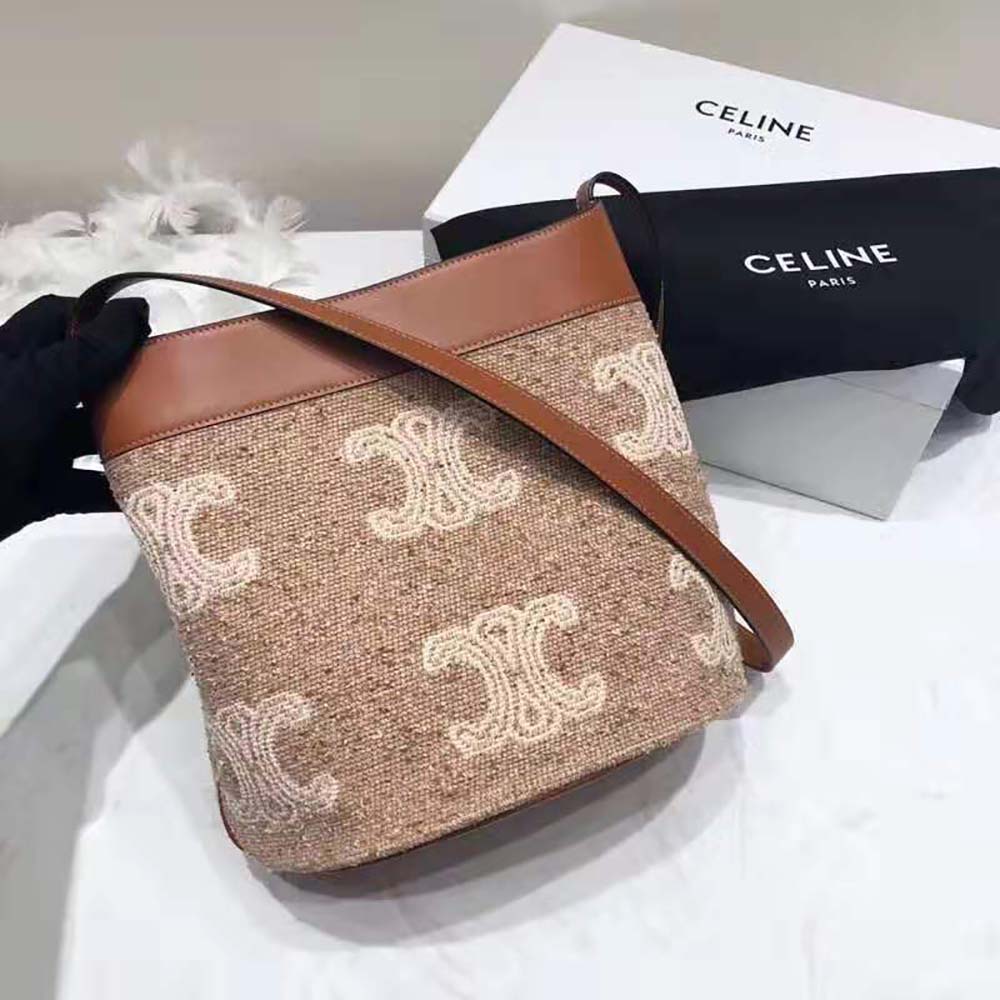 Close-up of gold Triomphe hardware on Celine Small Soft Bucket Bag