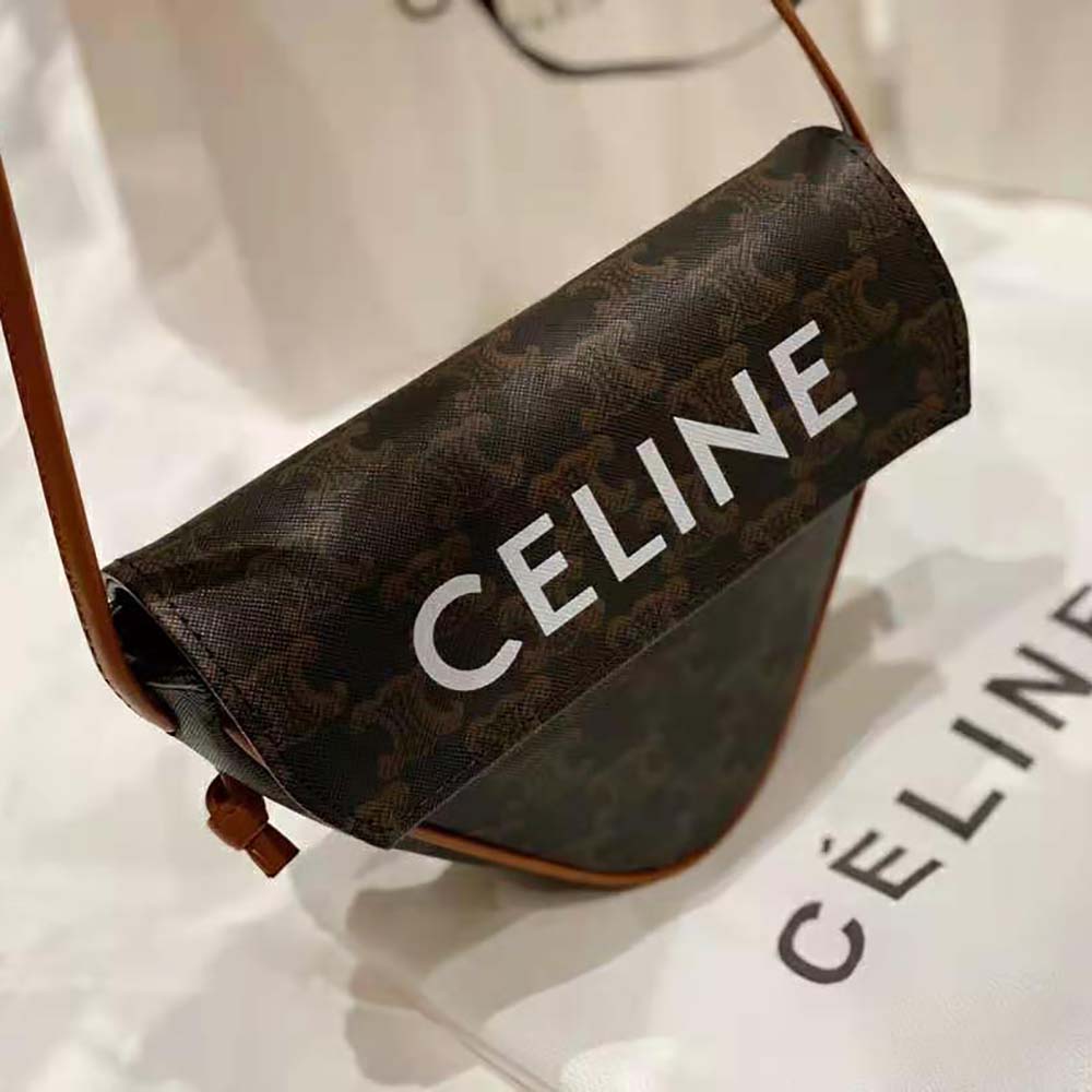 Side angle showing adjustable strap and silhouette of Celine Triangle Bag