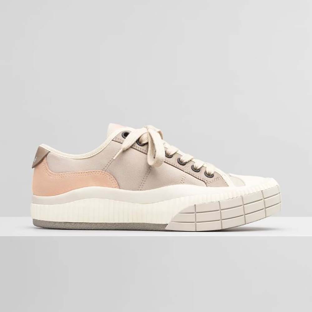 Side view of Chloe Women Clint Low-Top Sneaker in pink nylon and suede