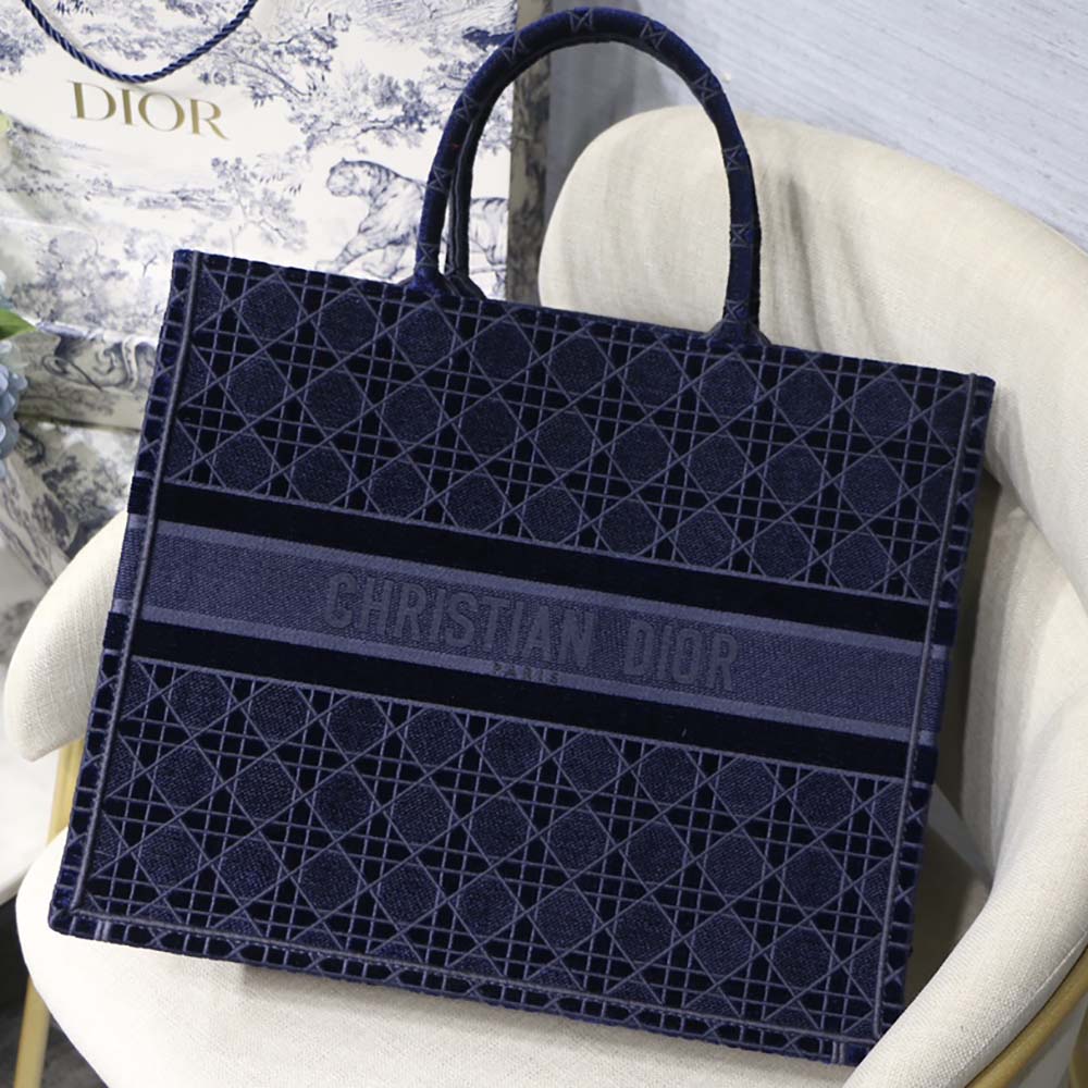 Close-up detail of Cannage embroidery on Dior Book Tote Blue velvet