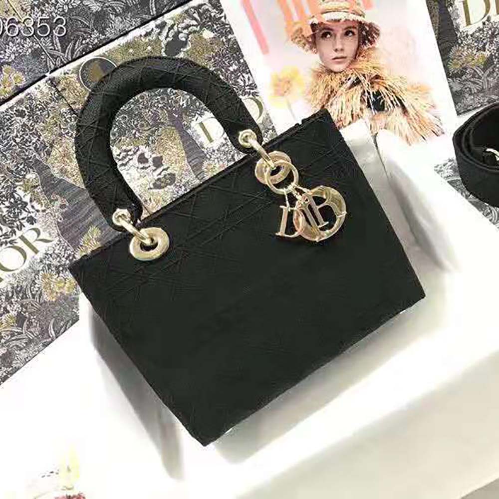 Close-up detail of black cannage embroidery on Dior Medium Lady D-Lite Bag