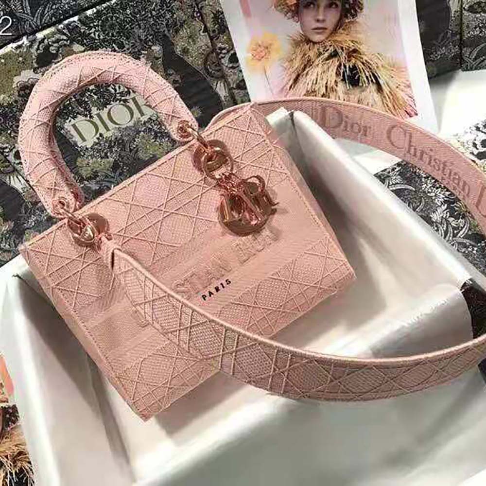 Close-up of pink embroidered Cannage detail on Dior Medium Lady D-Lite Bag